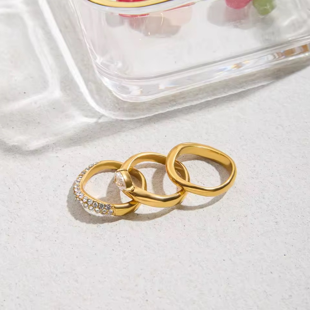 NEW 18K GOLD PLATED TRIO RING SET “AUREA” – Wave + Pavé + Pear Solitaire (US 7) - Picture 4 of 5